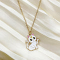 Cat-shaped pendant necklace on a white fabric background