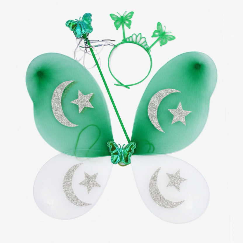 A children's fairy costume accessory set featuring green and white butterfly wings with gold glitter crescent moon and star designs, a green butterfly wand, a green tiara, and a green headband.