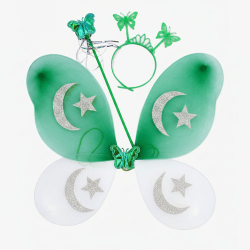 A children's fairy costume accessory set featuring green and white butterfly wings with gold glitter crescent moon and star designs, a green butterfly wand, a green tiara, and a green headband.